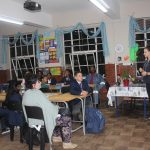 Benita Swanepoel gives an English lesson to her learners and their parents.