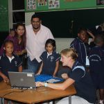 Ansi Joubert explains a lesson to one of her Grade 2 learners under the watchful eyes of parents.