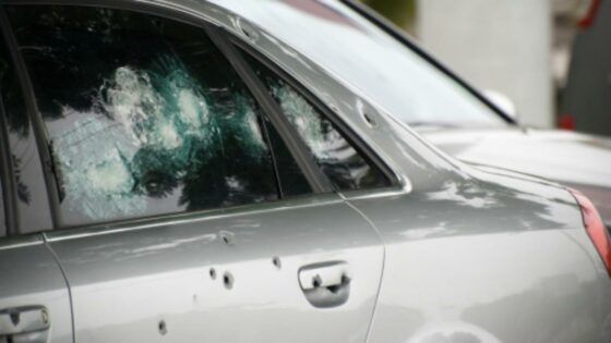 car bullet holes gunshots