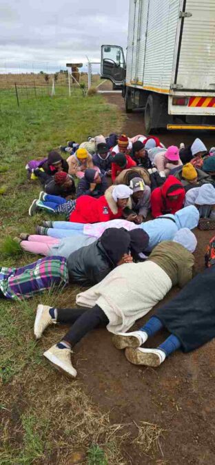 Newcastle textile industry bust, people laying on the ground