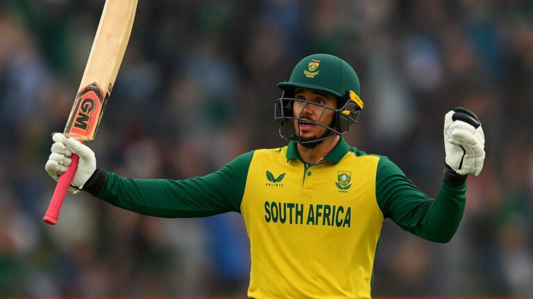 Quinton de Kock comeback: Image of Quinton de Kock holding up a bat on a cricket field